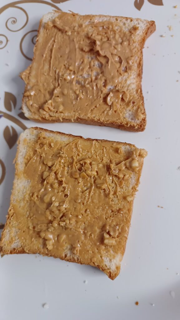 two-slices-of-bread-with-peanut-butter