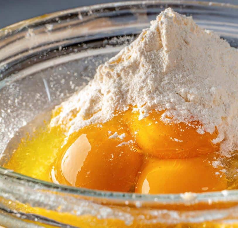 flour-and-eggs-in-a-glass-bowl